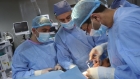 القوات المسلحه الاردنيه :المستشفى  الميداني في  غزة  ينقذ يدفتاة  من البتر ويستخرج  شظيه من جمجمة طفل