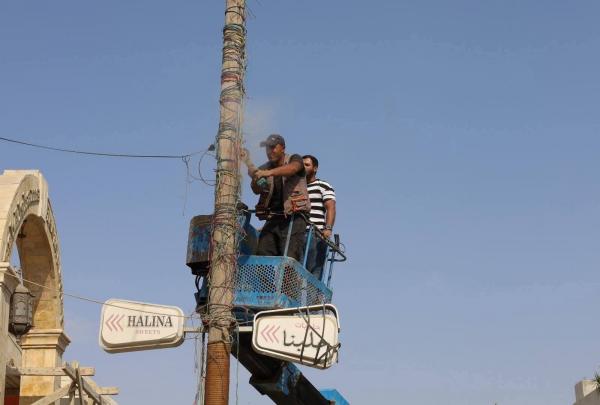 حملة في مادبا لإزالة اليافطات المخالفة وتحسين المظهر العام