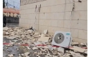 سقوط واجهة مبنى في إربد بسبب الظروف الجوية