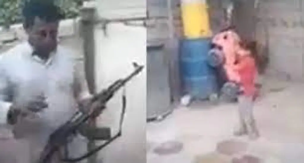 مشهد مرعب.. قناص عراقي يتدرب على جسد طفلته